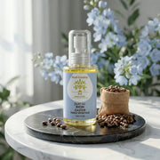 Flacon ambré d'huile de ricin bio Jodhur sur marbre — stimule pousse cils, sourcils et cheveux Maroc