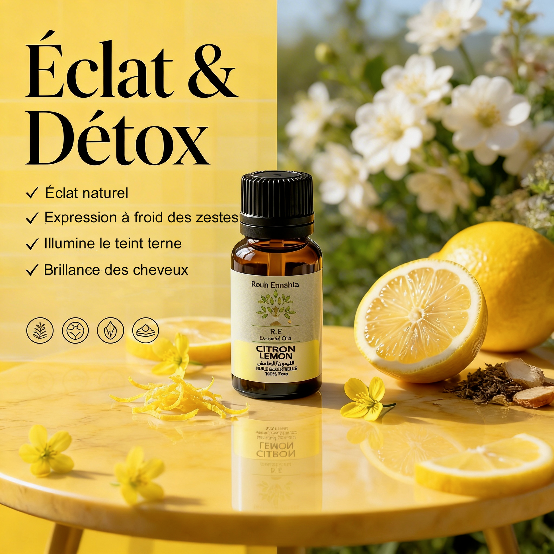Huile Essentielle de Citron BIO – Éclat & Détox bottle with lemons and flowers on a yellow surface outdoors