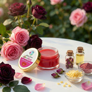 Baume à Lèvres Rose – Hydratation & Douceur Naturelle lip balm with rose petals, oil, and natural ingredients on white surface.