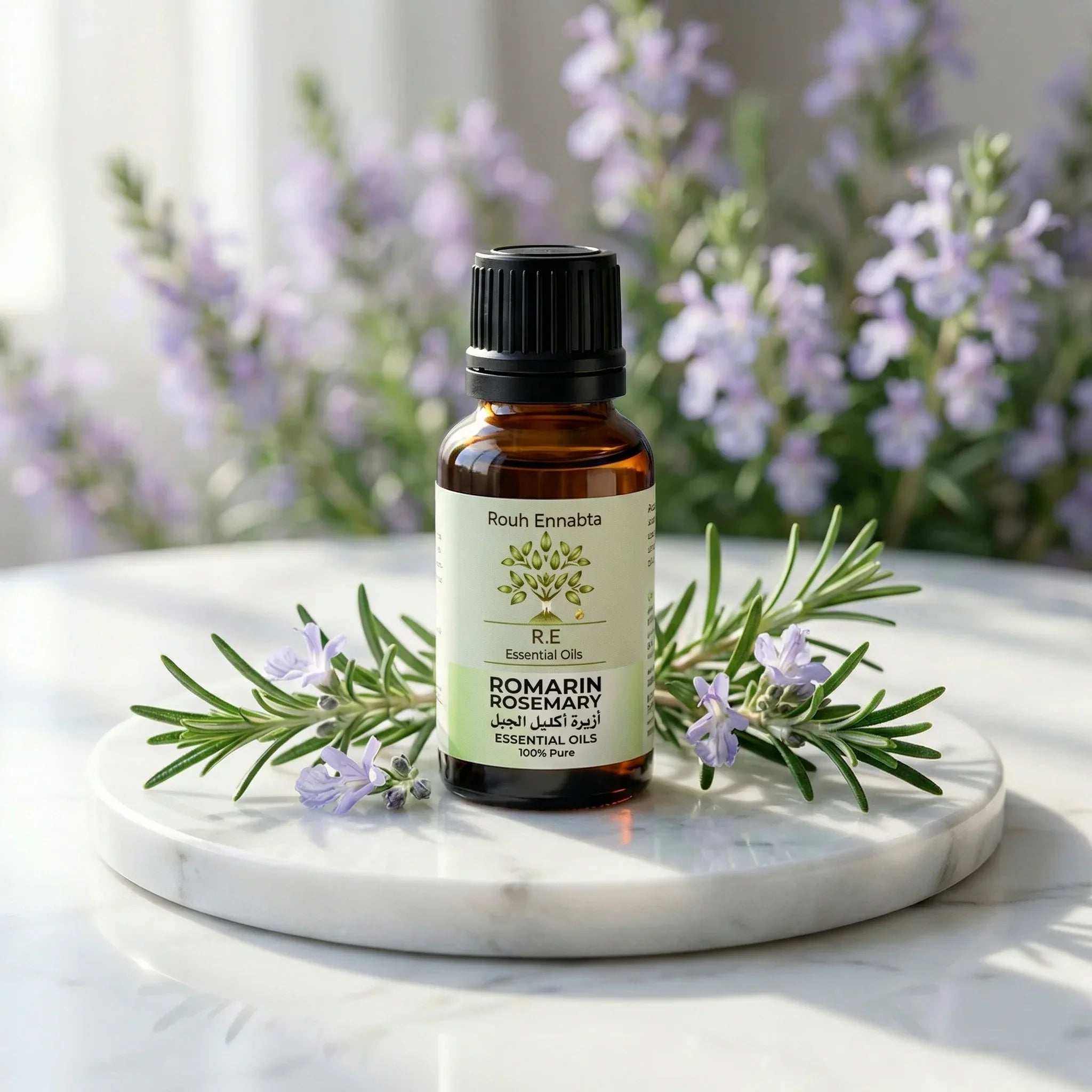 Huile Essentielle Romarin à Cinéole BIO | Tonifie le cuir chevelu & stimule la pousse with rosemary sprigs on marble plate